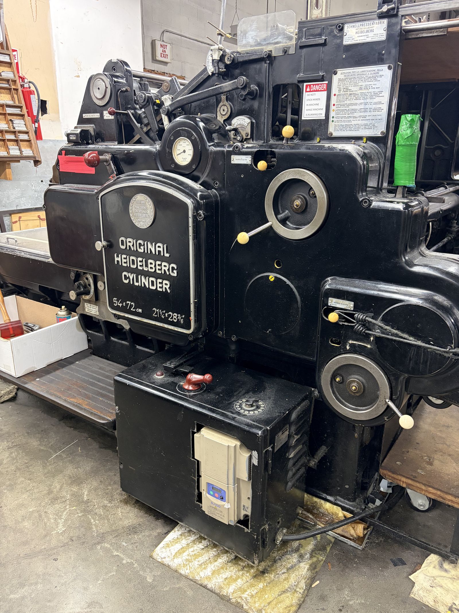 An Original Heidelberg Cylinder press in factory black, its cast nameplate reading Original Heidelberg Cylinder.